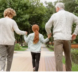 Couple walking with young girl