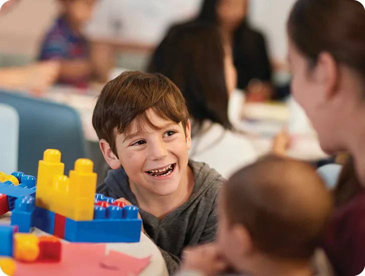 family playing with blocks