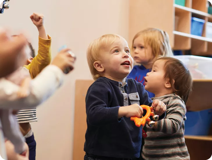 group of toddlers dancing