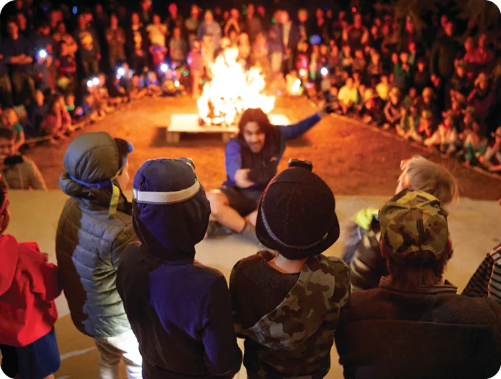 children around a campfire